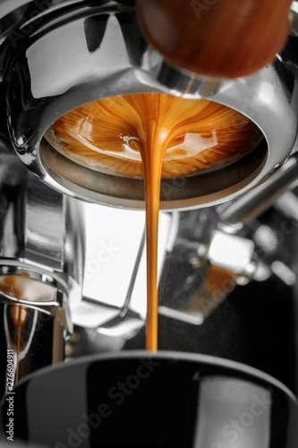 Espresso shot from espresso machine © Mikhail