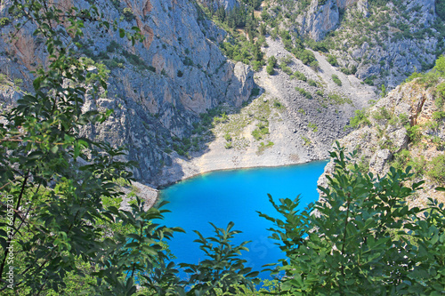 karst lake in the village of Imotski in Croatia photo