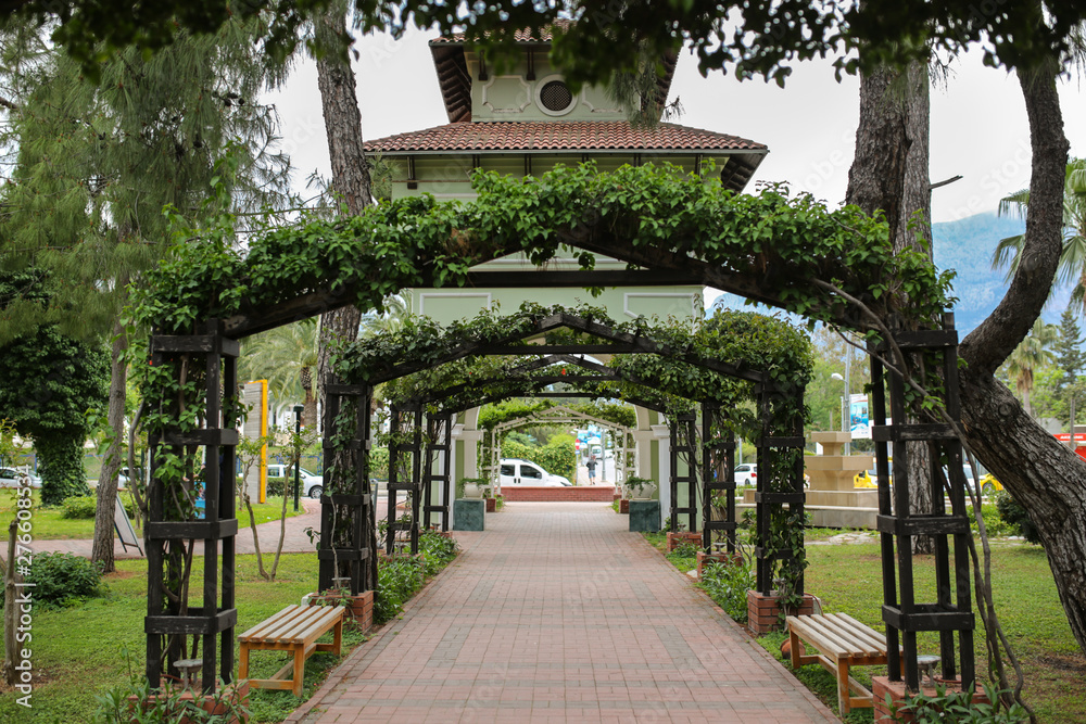 Green square wooden arch in park in Kemer, Turkey Green square wooden arch in park in Kemer, Turkey