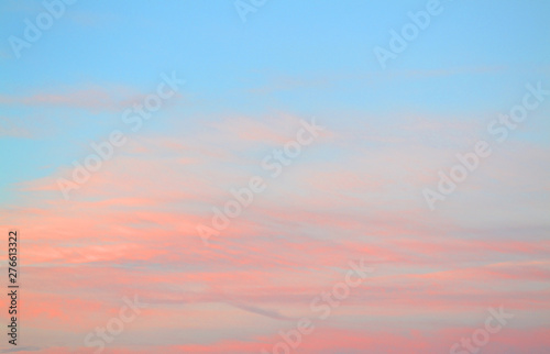 Romantic pink sunset sky, background Sunset sunrise in pastel blue and pink or coral color. Summer morning Colorful sky during sunrise and sunset.