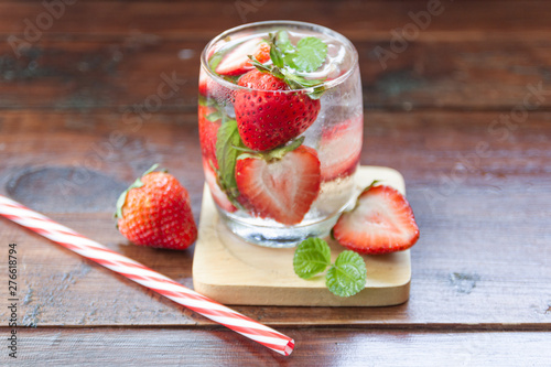 fresh Strawberry mojto cocktail with ice and mint in glass fruit to make water in the summer. photo