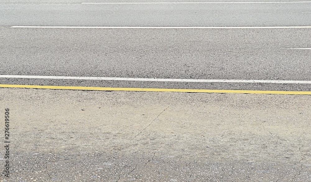 Fototapeta premium yellow lines on the road