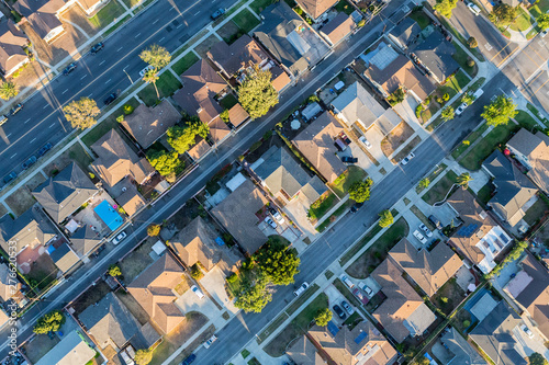 Aerial view of residential rooftops, streets and alleys in the Southbay area of Los Angeles County California. photo