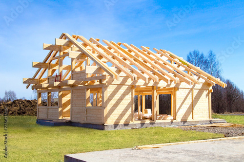 Construction of cottage. Construction site. Project of the house from the profiled bar. Remodeling of the cottage. The house wooden base. Building of houses under the key. Production of wooden houses.