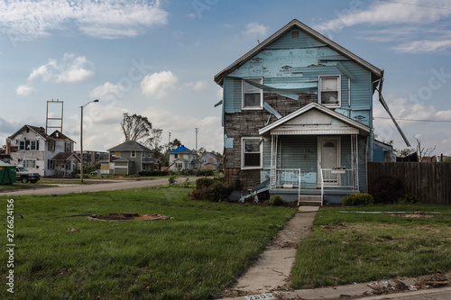 Neighborhood shredded by tornado starting to recover with green lawn