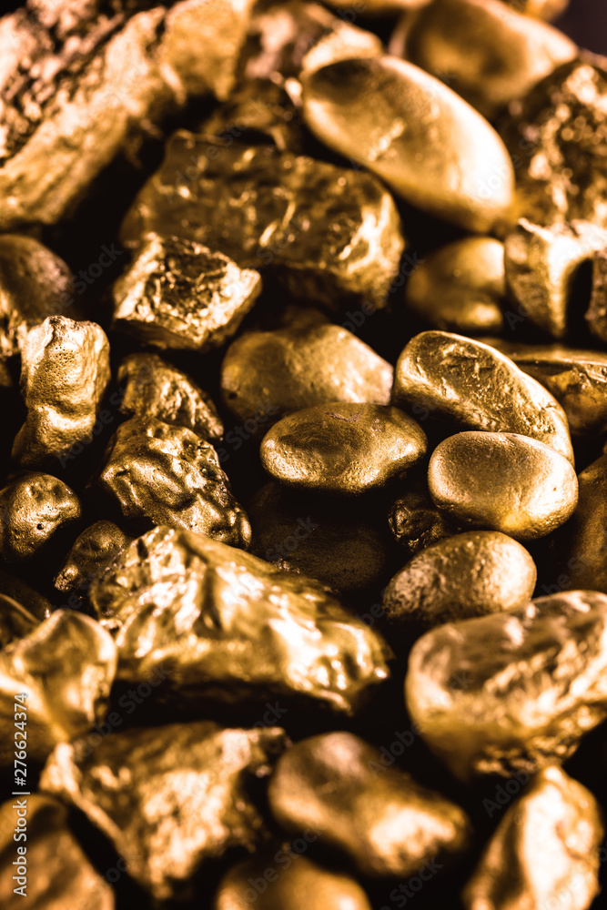 gold texture, many gold nugget, stone of value. Crude gold drawn on black background. Concept of wealth or luxury. gold texture, many gold nugget, stone of value. Crude gold drawn on black background. Concept of wealth or luxury.