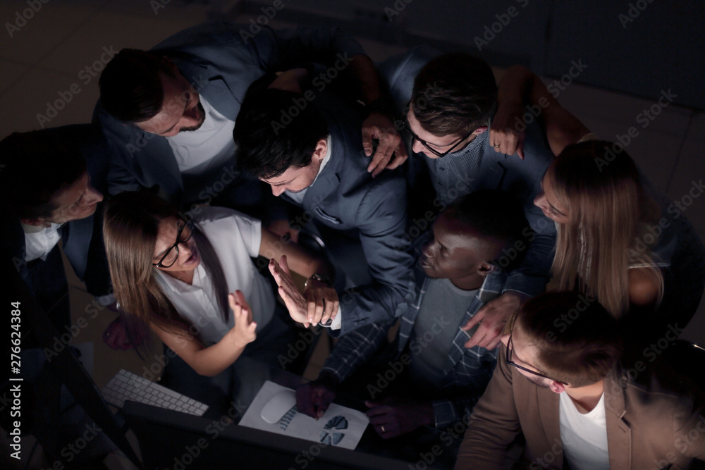 Fototapeta premium close up.business team giving each other high five