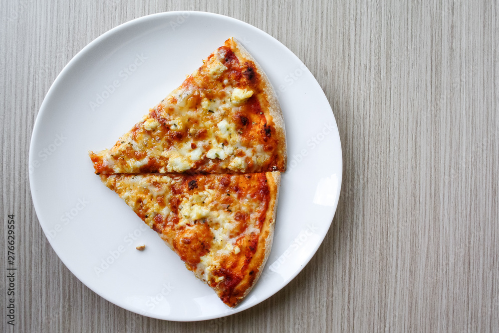 Italian pizza four cheese on white dish Italian pizza four cheese on white dish