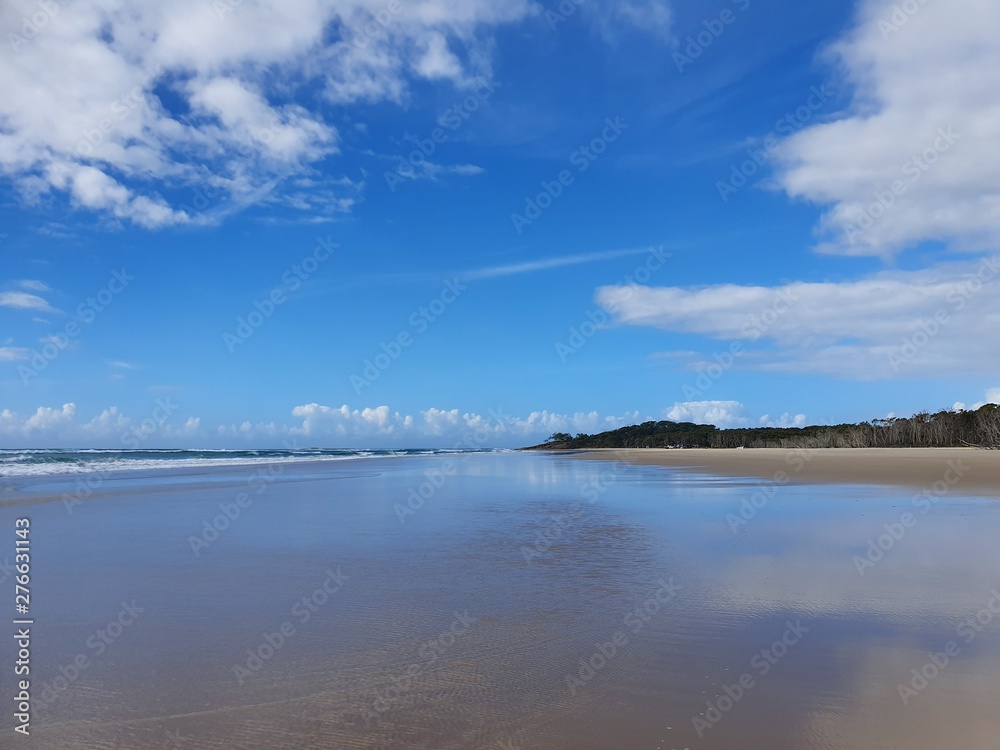 clouds over the beach