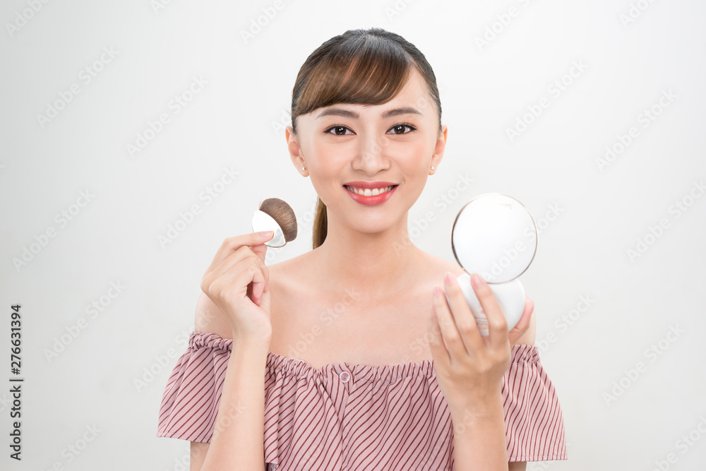 Beautiful Female With Cushion Puff And Mirror Applying Makeup Powder Foundation Beautiful Female With Cushion Puff And Mirror Applying Makeup Powder Foundation