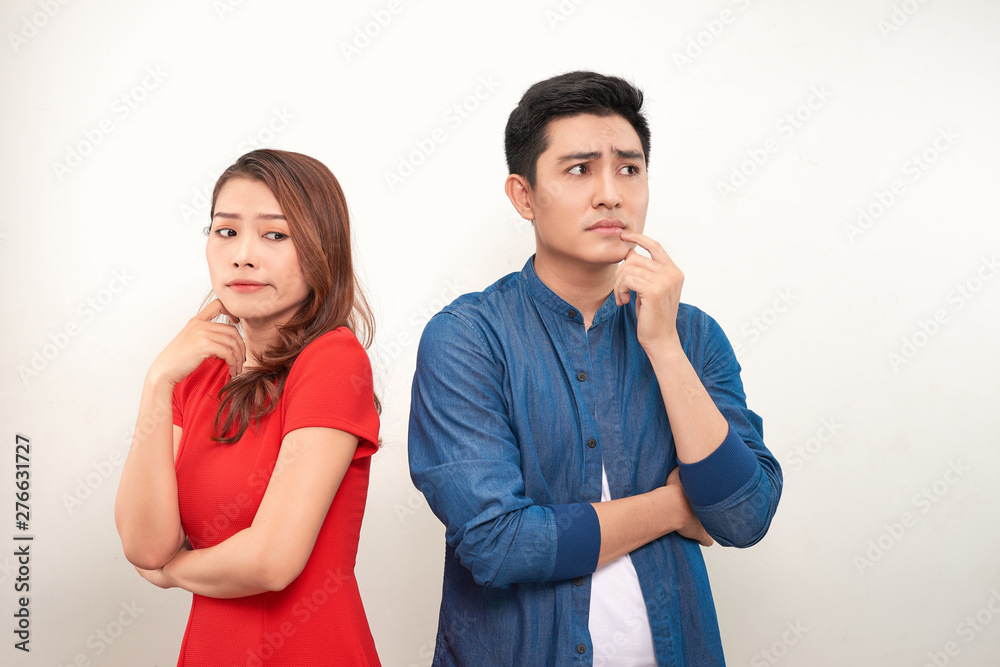 Depressed couple after quarrel on white background Depressed couple after quarrel on white background