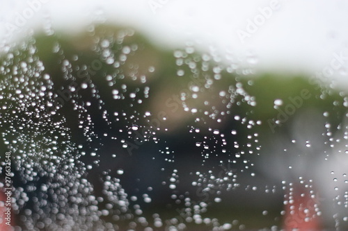 water drops on glass of car