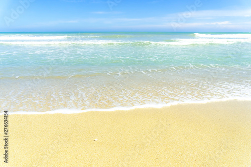 Tropical nature clean beach and white sand in summer with sun light blue sky and bokeh background.