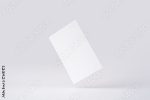 front view of white business card on white © voyata