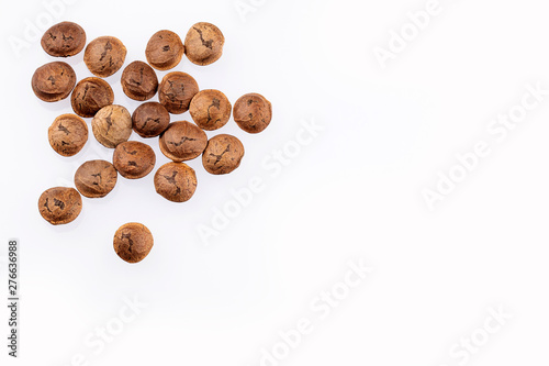 Dried seeds of sacha fruit - Inchi peanuts - Plukenetia volubilis. White background