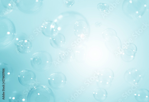 Blue soap bubbles background.