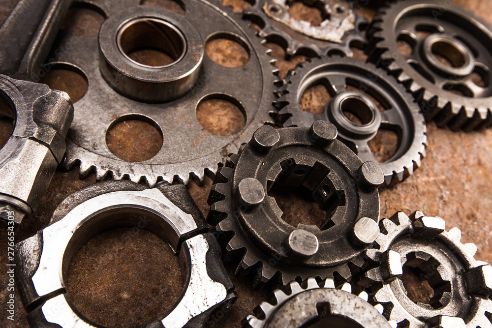 Various car parts and accessories, on metal background - Image Various car parts and accessories, on metal background - Image