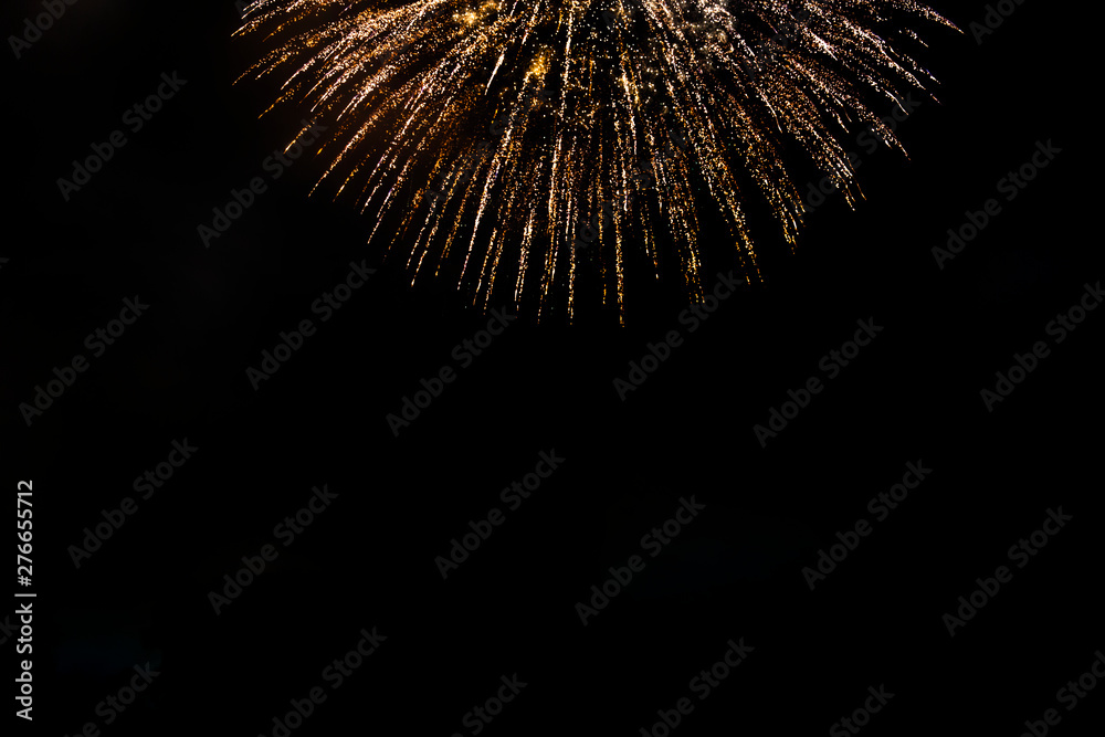 Awesome isolated Festive fireworks on a dark background. Can be used as wallpaper or background Awesome isolated Festive fireworks on a dark background. Can be used as wallpaper or background