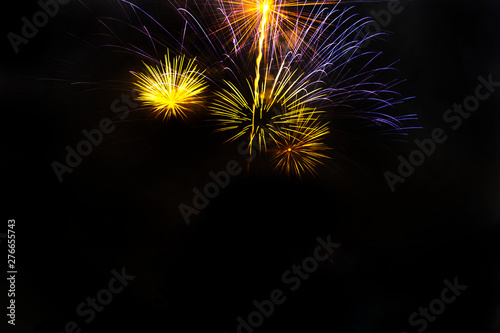 Awesome isolated Festive fireworks on a dark background. Can be used as wallpaper or background