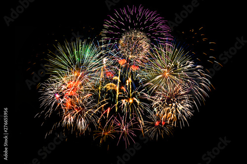 Awesome isolated Festive fireworks on a dark background. Can be used as wallpaper or background