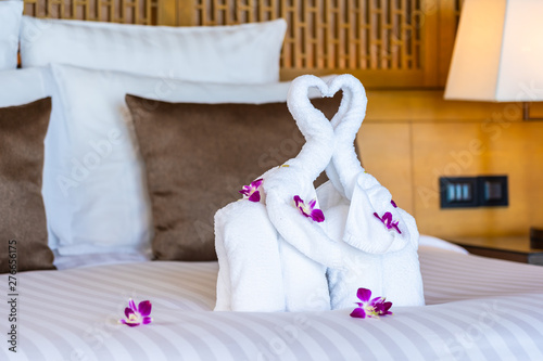 Beautiful elephant towel on bed decoration in bedroom interior