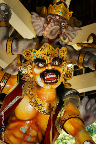 Ogoh ogoh, traditional mask-statue  of bad spirit,during nyepi carnival parade in bali- Indonesia photo