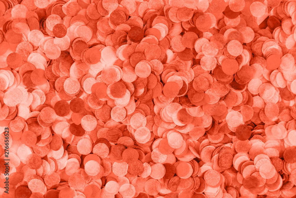Fototapeta premium Bright coral confetti isolated on white background.
