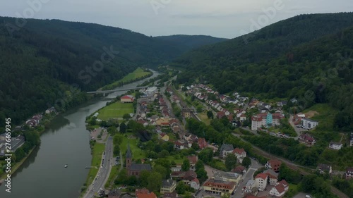 Aerial of the castle Hirschhorn in Germany beside the river neckar. Descending behind the castle. photo