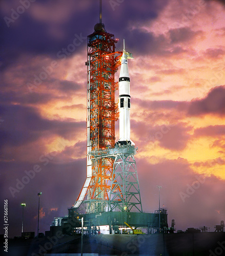 Spaceship at the launch site in the spaceport. Silhouette of space shuttle at dusk. Some elements of this image are furnished by NASA