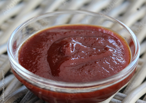 Smoked red bbq sauce in glass bowl