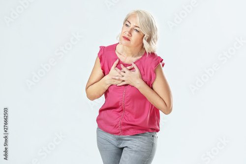Mature woman suffering from...