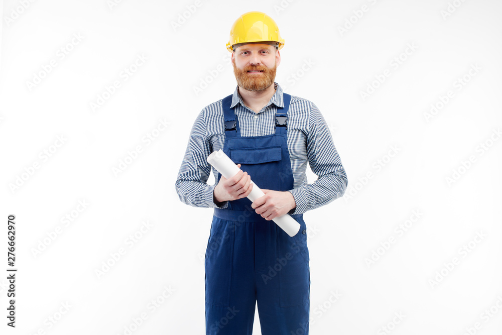 Engineer with drawings in his hands looking into the camera Engineer with drawings in his hands looking into the camera