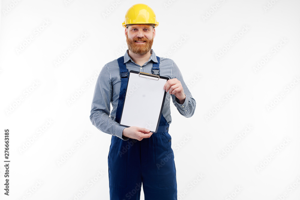 Engineer shows notepad on camera on a white background Engineer shows notepad on camera on a white background