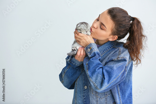 Beautiful young woman with ...