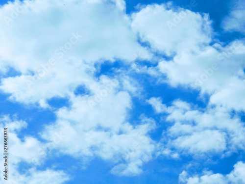 bright blue sky with white clouds