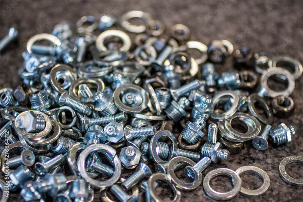 Various hardware: bolts, nuts, washers, screws. Various hardware: bolts, nuts, washers, screws.