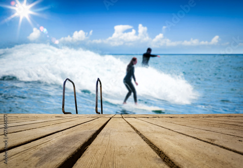 Table background of free space and summer background of beach 