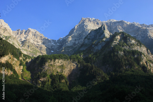 Mount Glaernisch in early summer. View from Lake Kloental.