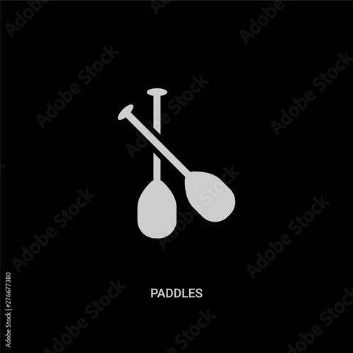 white paddles vector icon on black background. modern flat paddles from nautical concept vector sign symbol can be use for web, mobile and logo.