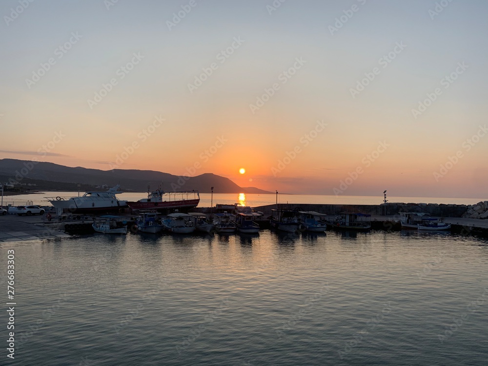 sunset at the sea hourbor Latchi Cyprus