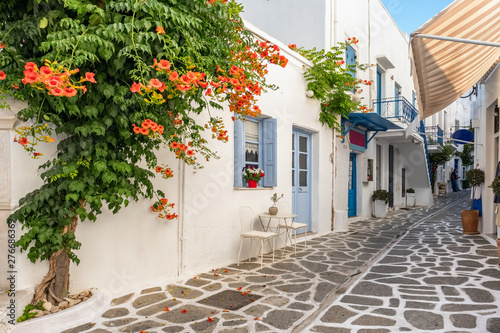View of a typical narrow street in old town of Parikia, Paros island, Greece