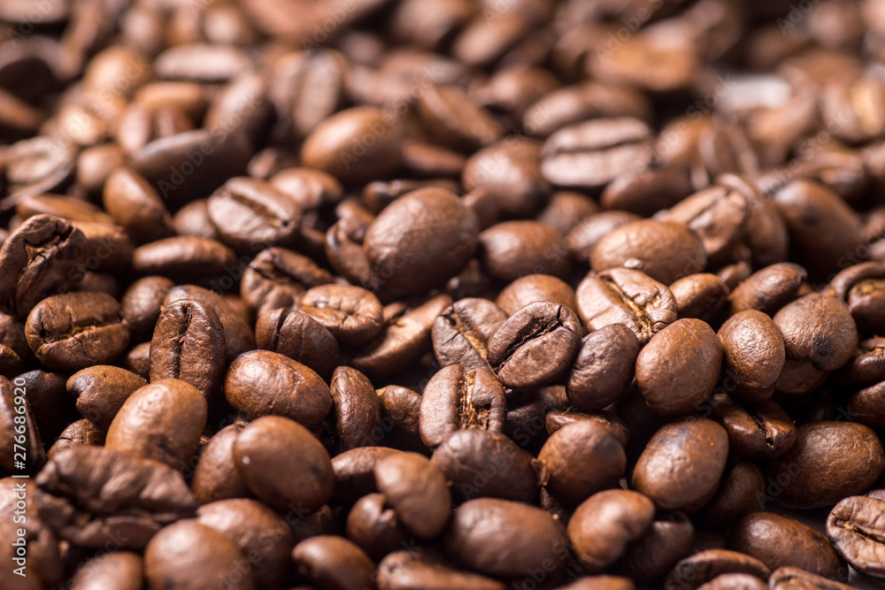 coffee beans on burlap background coffee beans on burlap background