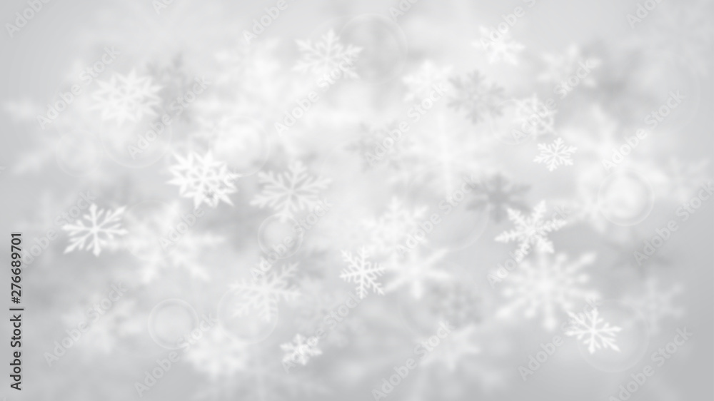 Christmas blurred background of complex defocused big and small falling snowflakes in white and gray colors with bokeh effect