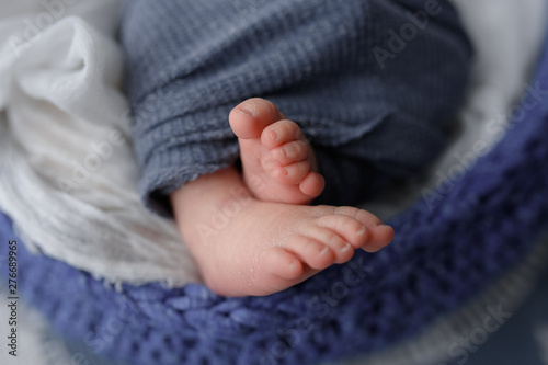 Feet newborn boy. Shot from close range. © wolfhound911