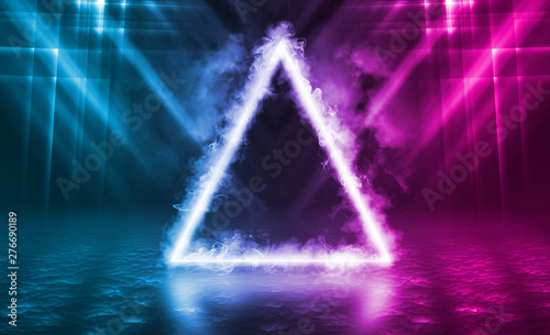 Empty background scene. Dark reflection of the street on the wet asphalt. Rays of neon light in the dark, neon figure of a triangle, smoke. Background of empty stage show. Abstract dark background.