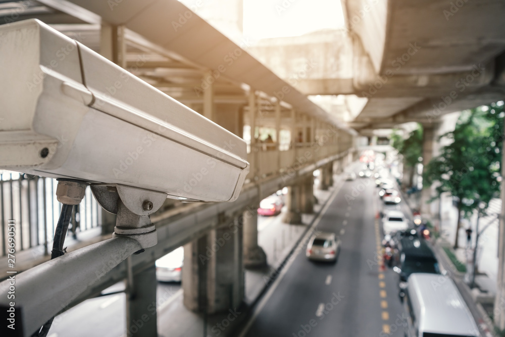 outdoor security CCTV camera in traffic, view from skywalk outdoor security CCTV camera in traffic, view from skywalk