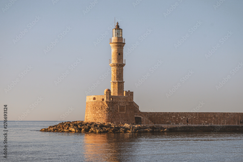 lighthouse at sunset, crete