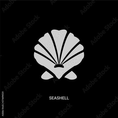 white seashell vector icon on black background. modern flat seashell from summer concept vector sign symbol can be use for web, mobile and logo. photo