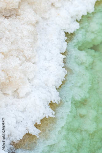 Close up view of salt crystals and mineral formation on the shore of Dead Sea in Israel