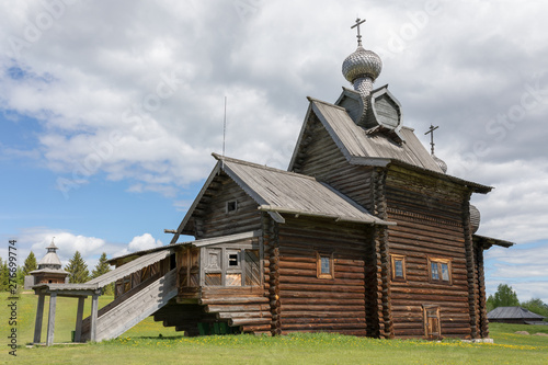 Old church on the outskirts of the Russian village in sunny summer day. Ready photo background.